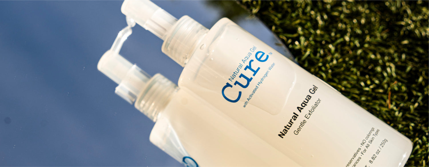 gentle aqua gel exfoliator for face and body, for all skin types including sensitive and combination on a mirror