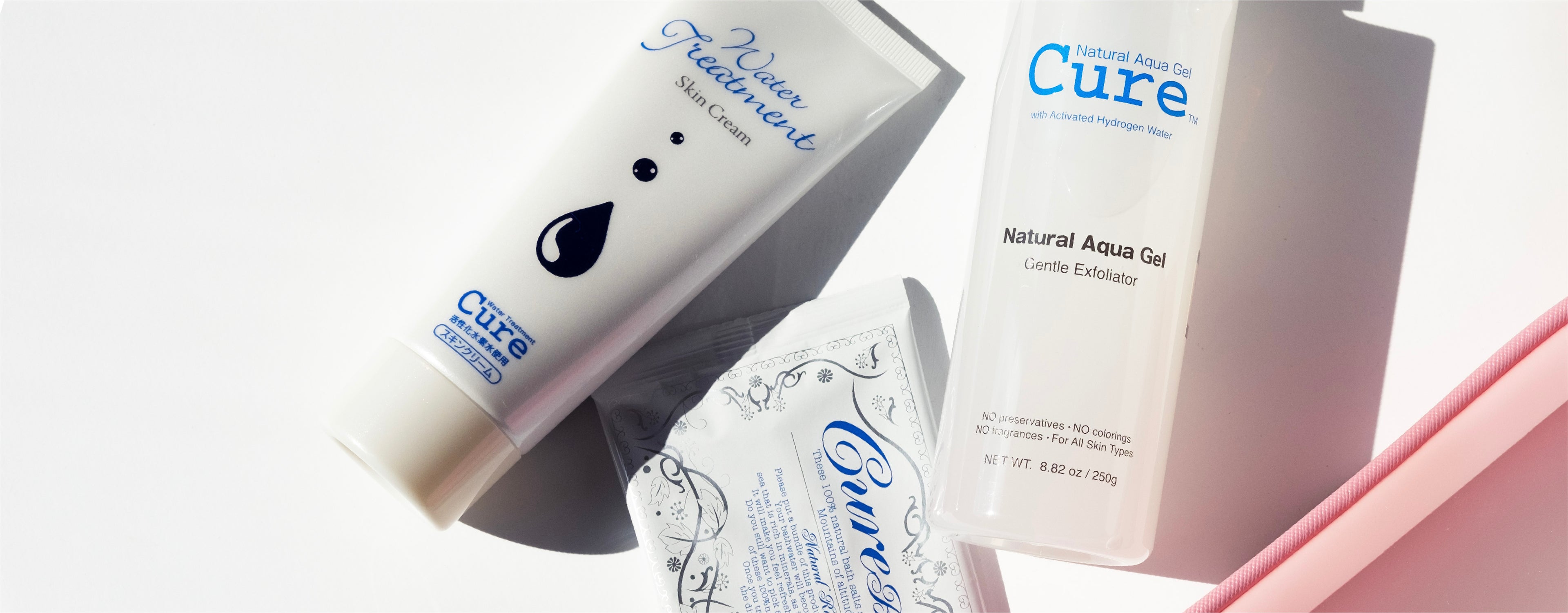 cure's gentle 3 step skincare for face and body featuring aqua gel exfoliator, water treatment moisturizer and bathtime mineral salts